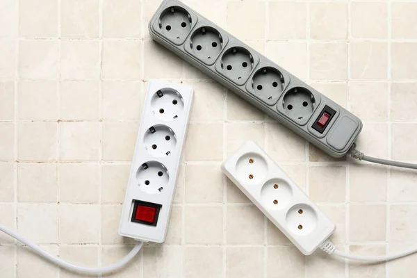 Electric Extension Cords Tile Background — Stock Photo, Image