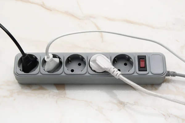 Electric Extension Cord Plugs White Marble Background — Stock Photo, Image