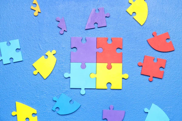 Puzzelstukjes Blauwe Achtergrond Wereld Autisme Bewustmakingsdag — Stockfoto