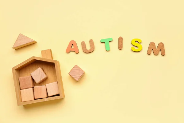 Word Autism Baby Toys Beige Background — Stock Photo, Image