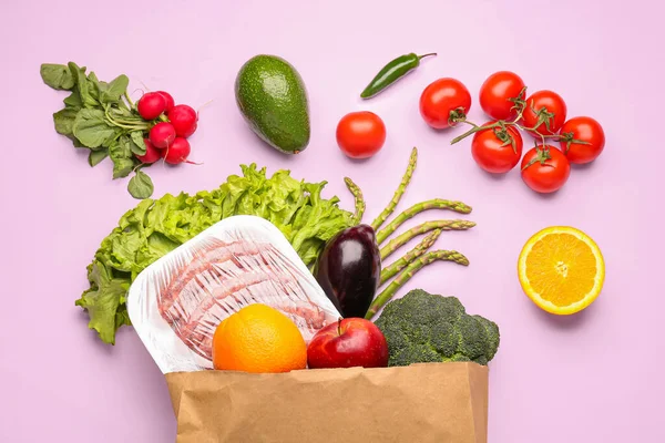 Paper Bag Vegetables Fruits Sausages Pink Background — Stock Photo, Image