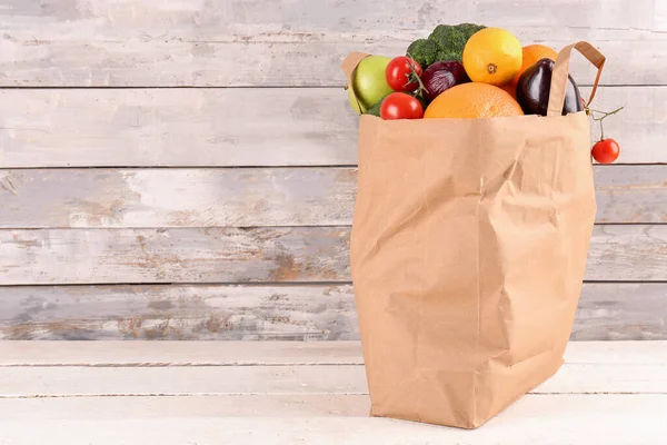Paper Bag Vegetables Fruits Light Wooden Table — Stock Photo, Image