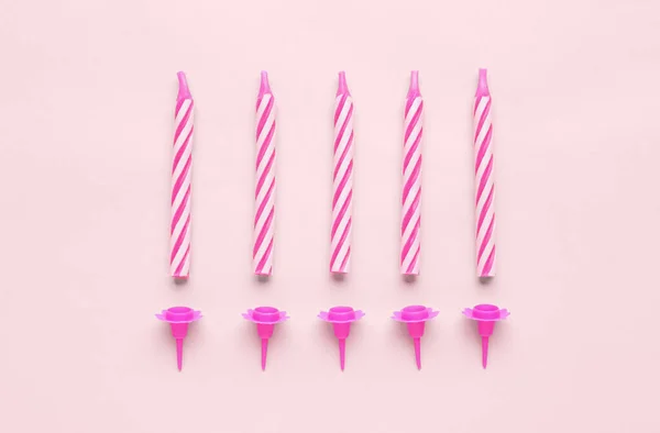 粉红背景的生日蜡烛 — 图库照片