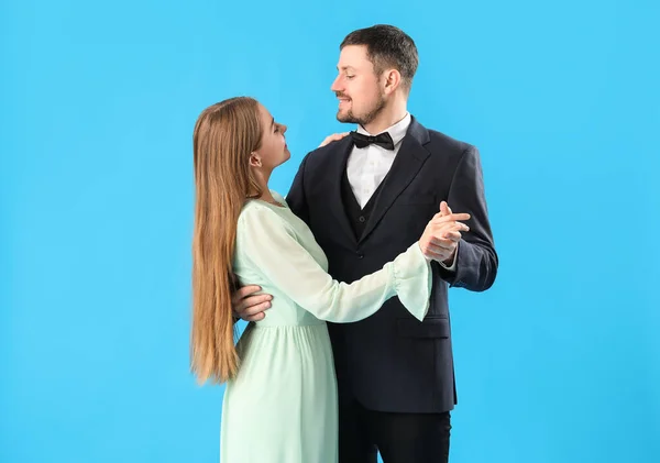 Elegant Young Couple Dancing Blue Background — Stock Photo, Image