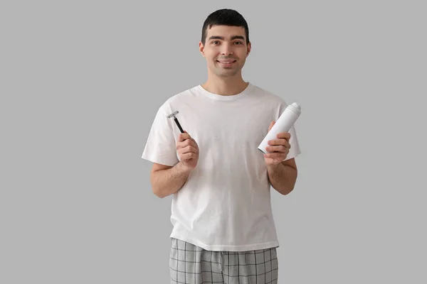 Young Man Shaving Foam Razor Light Background — Stock Photo, Image