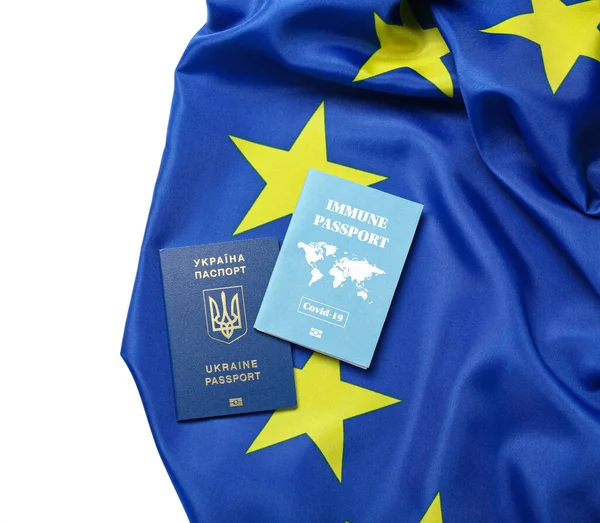 stock image Ukrainian and immune passports with flag of European Union on white background