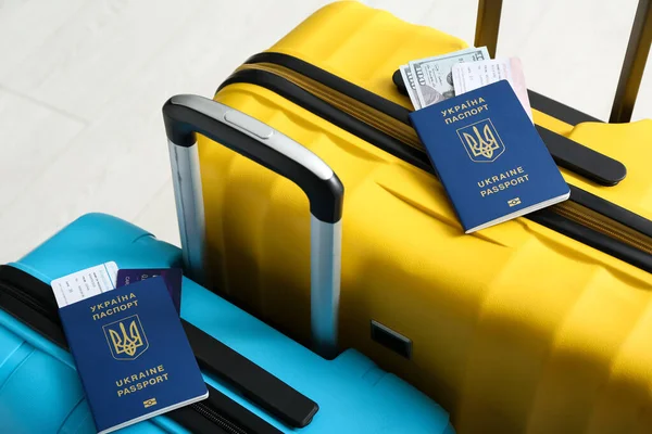 Suitcases Ukrainian Passports White Wooden Background Closeup — Stock Photo, Image
