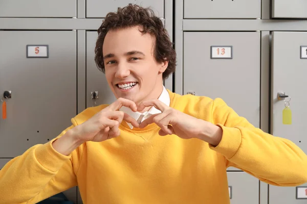 Teenage Boy Making Heart His Hands Locker School — Stock Photo, Image
