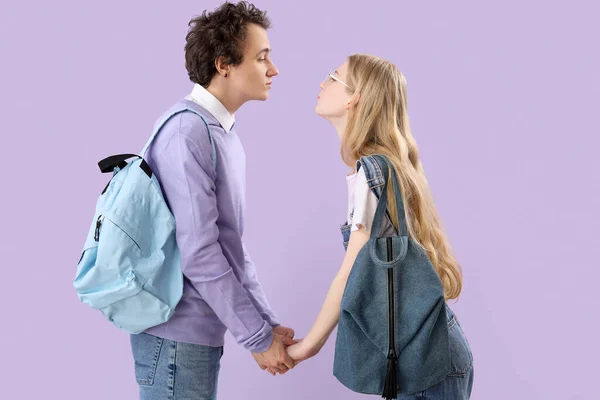 Teenage Couple Holding Hands Lilac Background — Stock Photo, Image