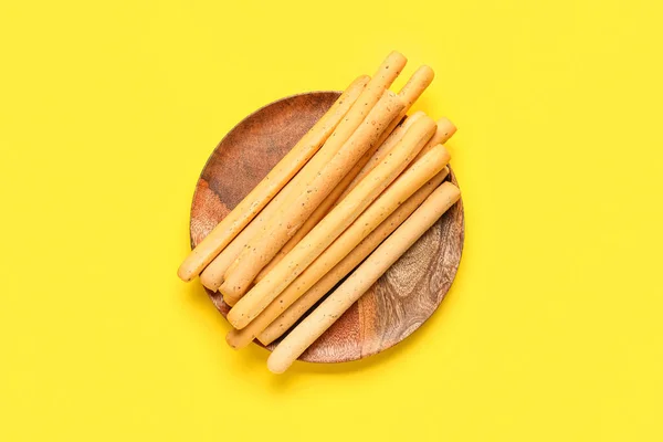 Plate Tasty Italian Grissini Yellow Background — Stock Photo, Image
