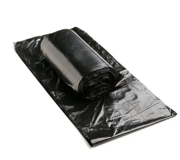 白い背景に隔離されたゴミ袋の黒いロール — ストック写真