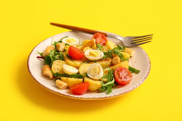 Plate Tasty Potato Salad Eggs Tomatoes Yellow Background — Stock Photo, Image