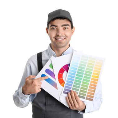 Male painter with color palettes on white background