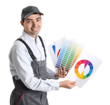 Male painter with color palettes on white background