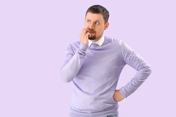 Handsome Man Biting Nails Lilac Background — Stock Photo, Image