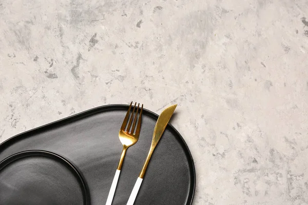 Black Tray Plate Fork Knife Grey Grunge Background — Fotografia de Stock