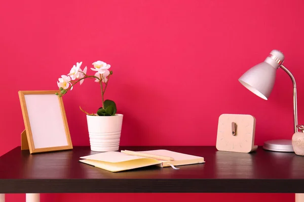 Workplace Notebook Frame Flower Clock Red Wall — Stock Photo, Image