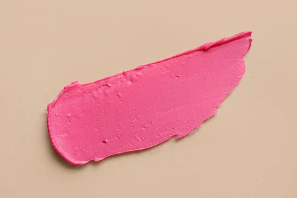 Pink Lipstick Stroke Beige Background — Stock Photo, Image
