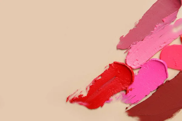 Different Lipstick Strokes Beige Background — Stock Photo, Image