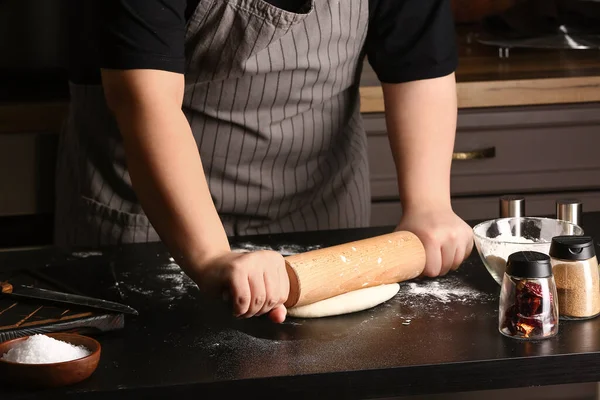 Stock image Woman preparing dough for Italian Grissini at table in kitchen, closeup