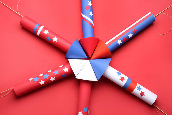 Firework rockets for Independence Day on red background