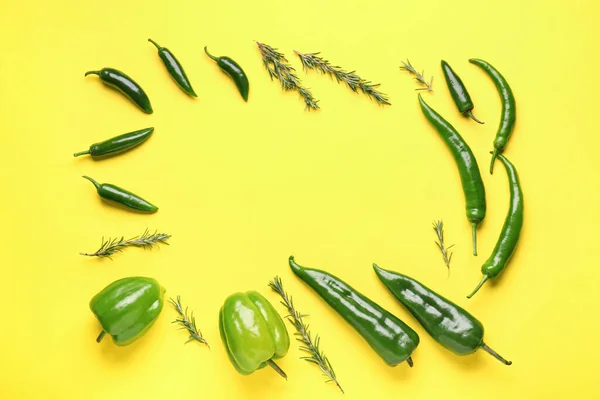 Frame Made Green Peppers Rosemary Yellow Background — Stock Photo, Image