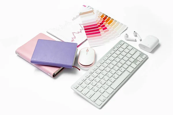 Composition with keyboard, notepad, documents and mouse on white background