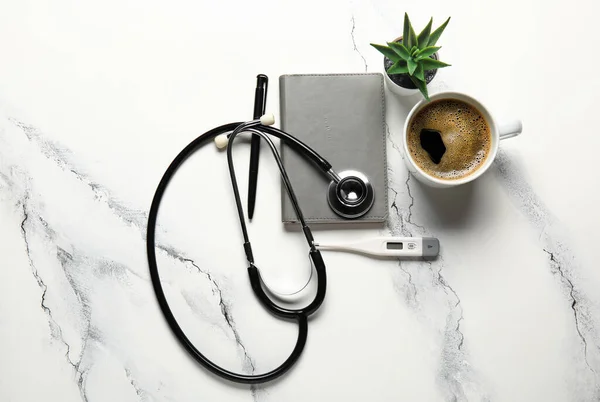 Stethoscope Notebook Coffee Thermometer Light Background — Stock Photo, Image