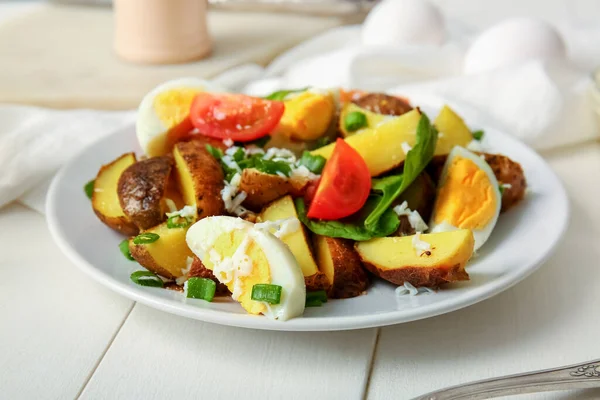Plate Tasty Potato Salad Eggs Tomatoes Light Wooden Background — Stock Photo, Image