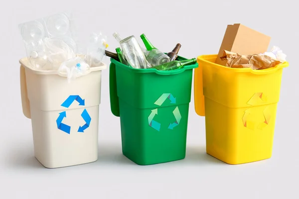 Containers Different Types Garbage Light Background Recycling Concept — Stock Photo, Image