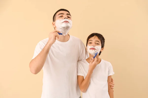 Father His Little Son Shaving Beige Background — Foto Stock