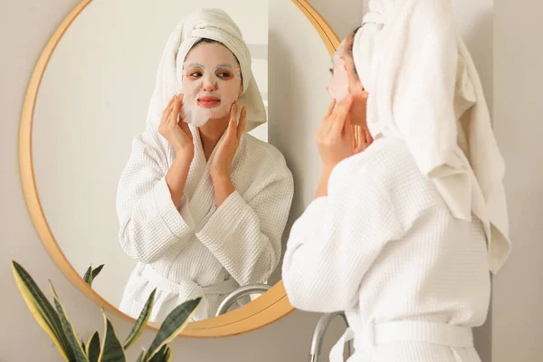 Young Woman Sheet Mask Mirror Bathroom — Stock Photo, Image