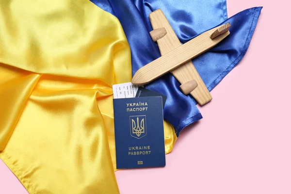 Passport Toy Airplane Flag Ukraine Pink Background — Stock Photo, Image