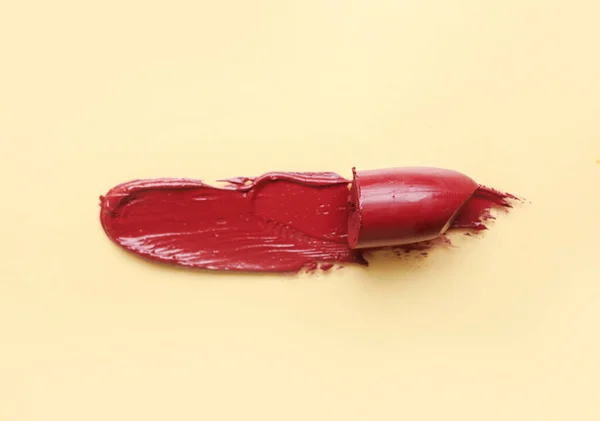 Red Lipstick Stroke Beige Background — Stock Photo, Image