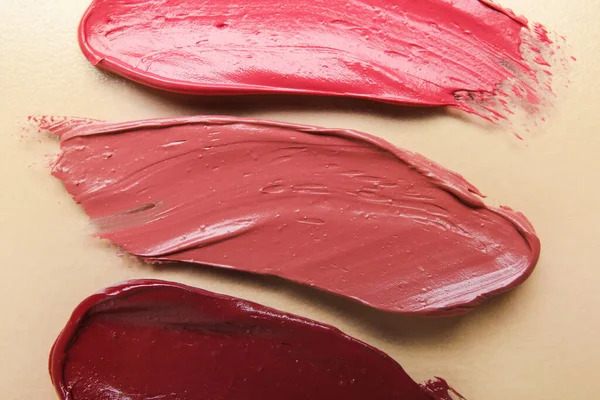 Lipstick Strokes Beige Background Closeup — Stock Photo, Image