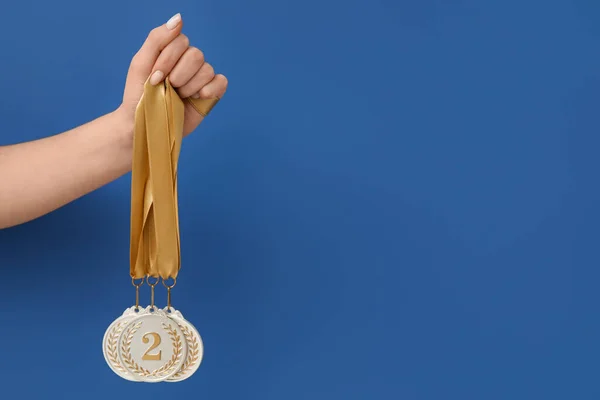 Woman Prize Medals Blue Background — Stock Photo, Image