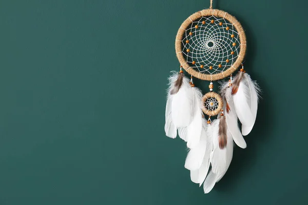 stock image Dream catcher hanging on green wall