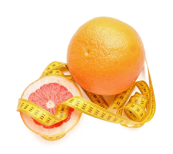 Cut Whole Grapefruit Yellow Measuring Tape White Background Diet Concept — Stock Photo, Image