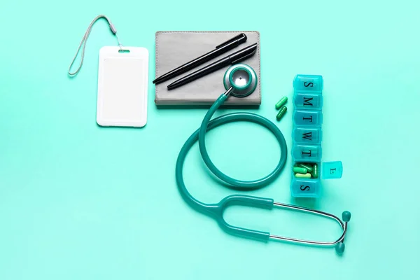 Stethoscope Notebook Badge Pills Turquoise Background — Stock Photo, Image