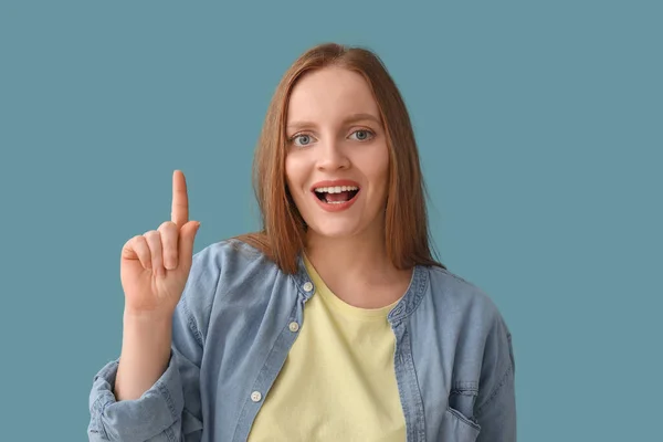 Beautiful Redhead Woman Pointing Something Blue Background — Stock Photo, Image
