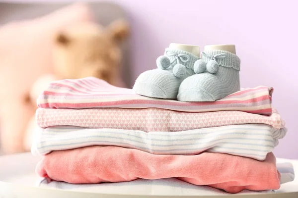 Stack Baby Clothes Socks Table Room Closeup — Stock Photo, Image
