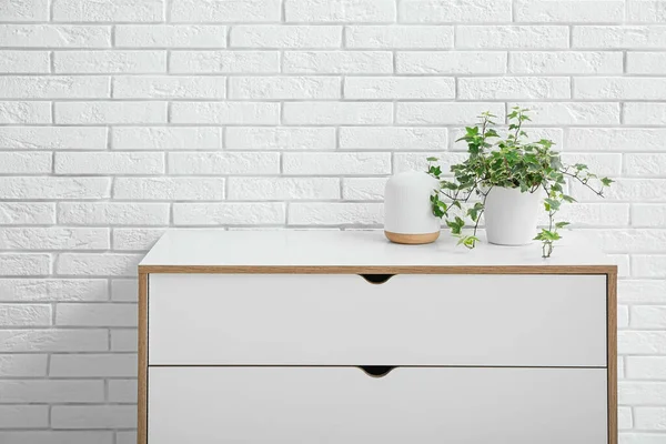Green Houseplant Lamp Chest Drawers White Brick Wall — Stock Photo, Image