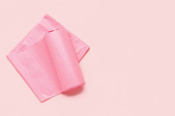 Roll Van Vuilniszakken Roze Achtergrond — Stockfoto