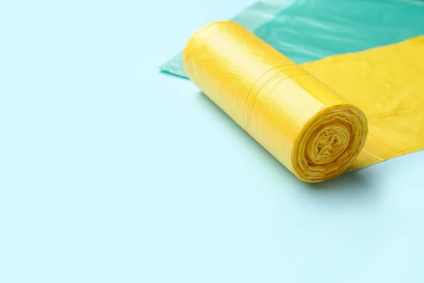 Yellow Roll Garbage Bags Blue Background Closeup — Stock Photo, Image
