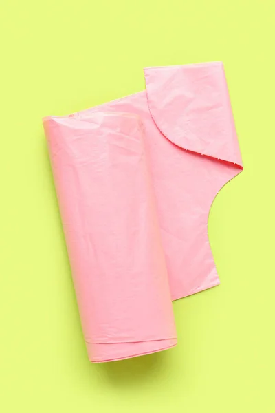 Pink Roll Garbage Bags Green Background — Stock Photo, Image