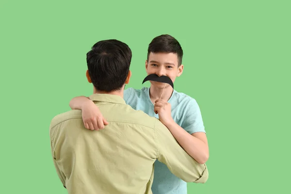 Father His Little Son Paper Mustache Green Background — Stock Photo, Image