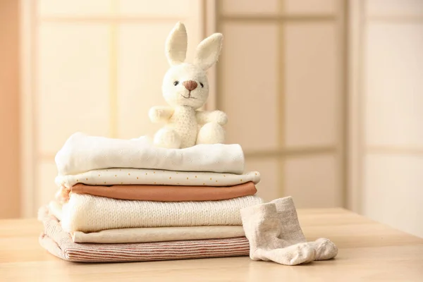 Stack Baby Clothes Socks Toy Bunny Table Room — Stock Photo, Image