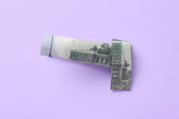 Origami Gun Made Dollar Banknotes Lilac Background — Stock Photo, Image