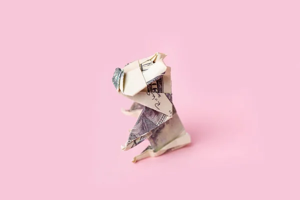 Origami Hund Aus Dollarnoten Auf Rosa Hintergrund — Stockfoto