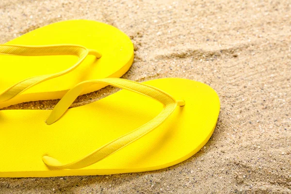 Yellow Flip Flops Sand Closeup — Stock Photo, Image